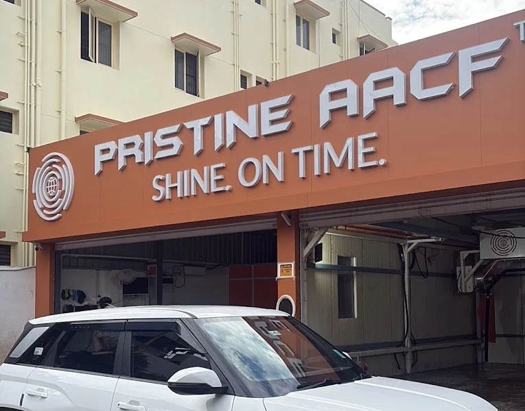 PRISTINE AACF experience-store facade and wash bay in Coimbatore